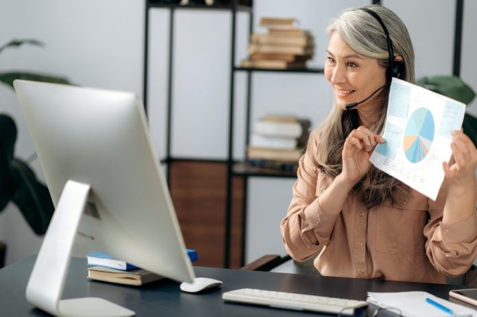 woman teaching through computer
