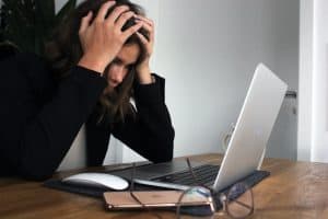 frustrated woman at computer